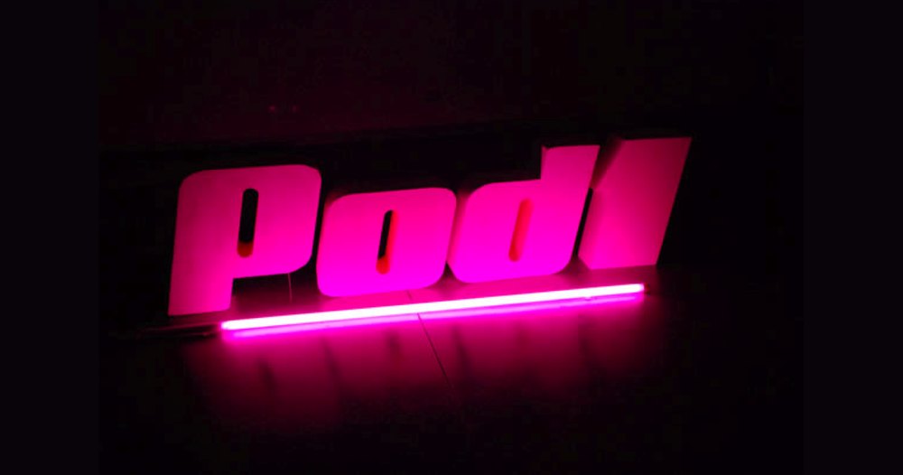 The pink neon Pod1 sign
