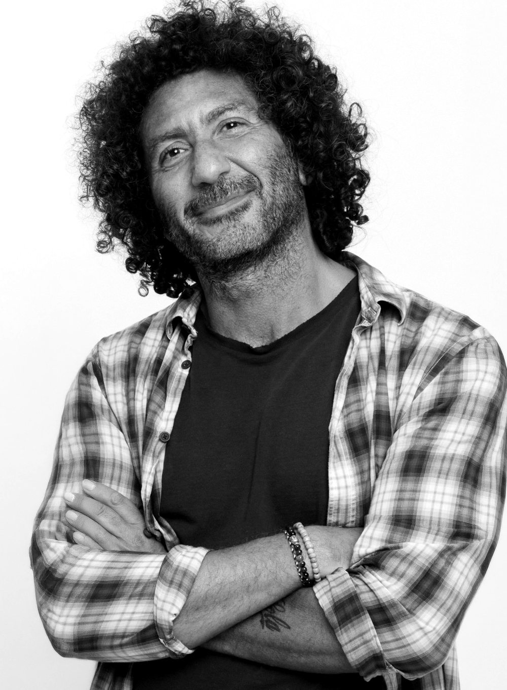 Fadi Shuman, arms folded, smiling